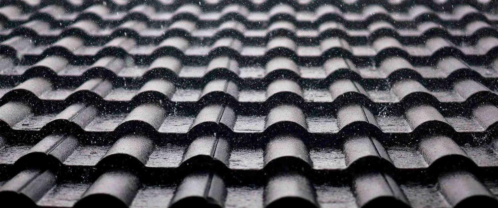 Picture of a tiled roof with rain falling on it in Papamoa Tauranga NZ.